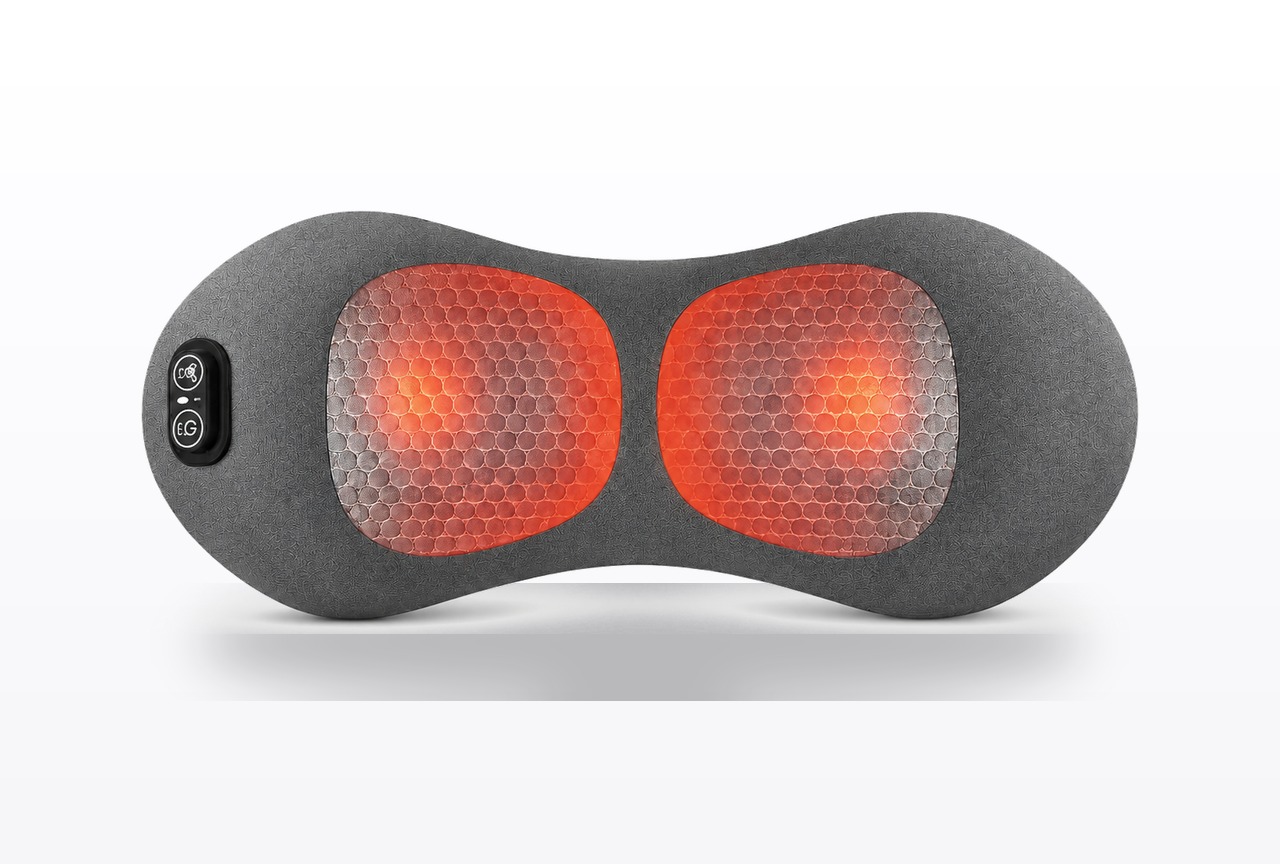 SpinePod™ lumbar relief device: grey twin-lobe shell with two heated massage nodes and a side control pad